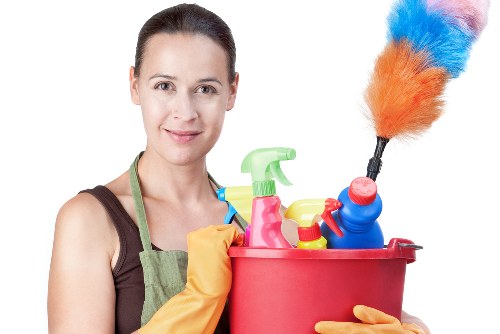 Carpet cleaning technician preparing equipment before a scheduled service